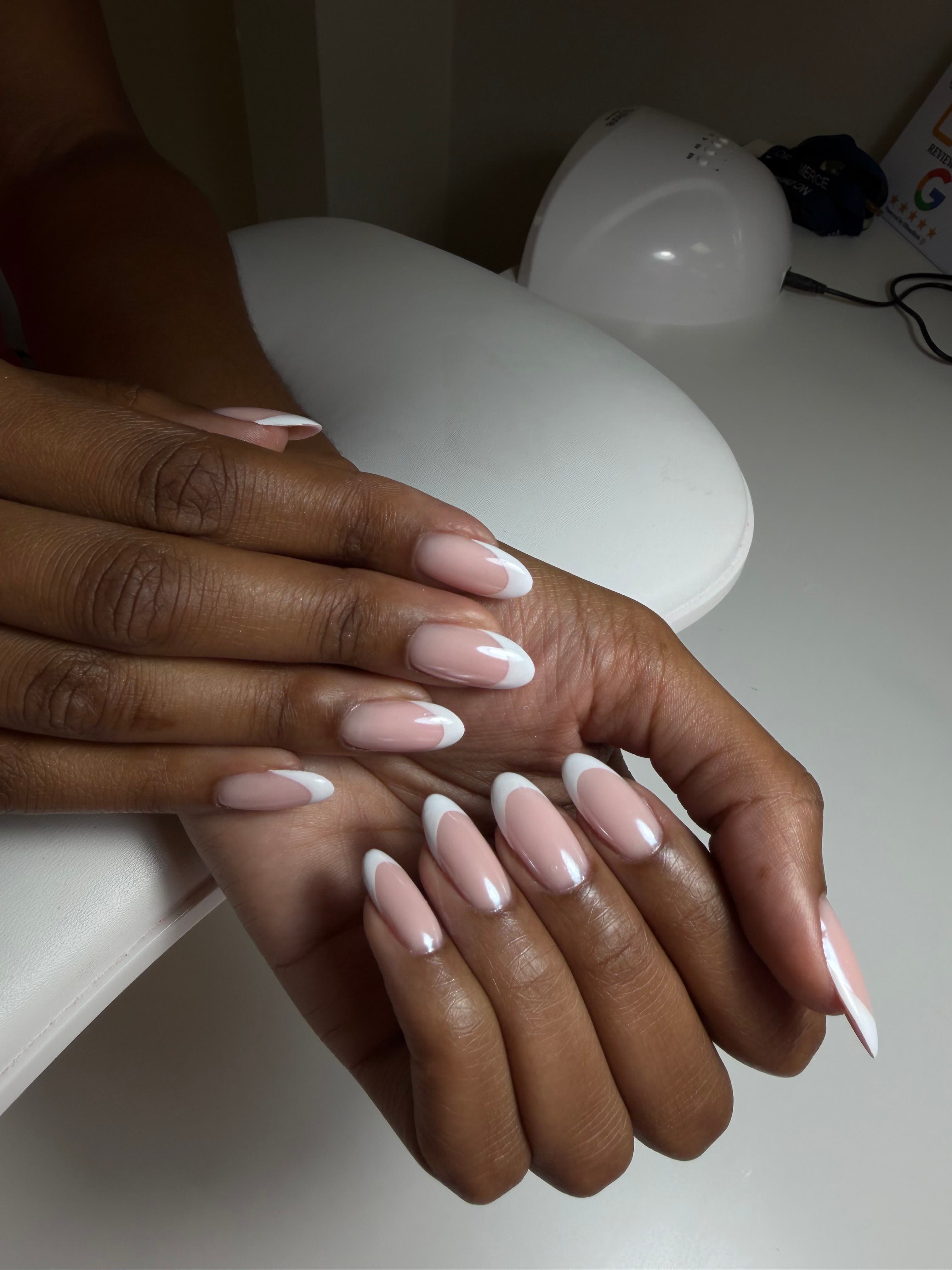 Almond French manicure with soft nude base at 4Hands in Charlotte