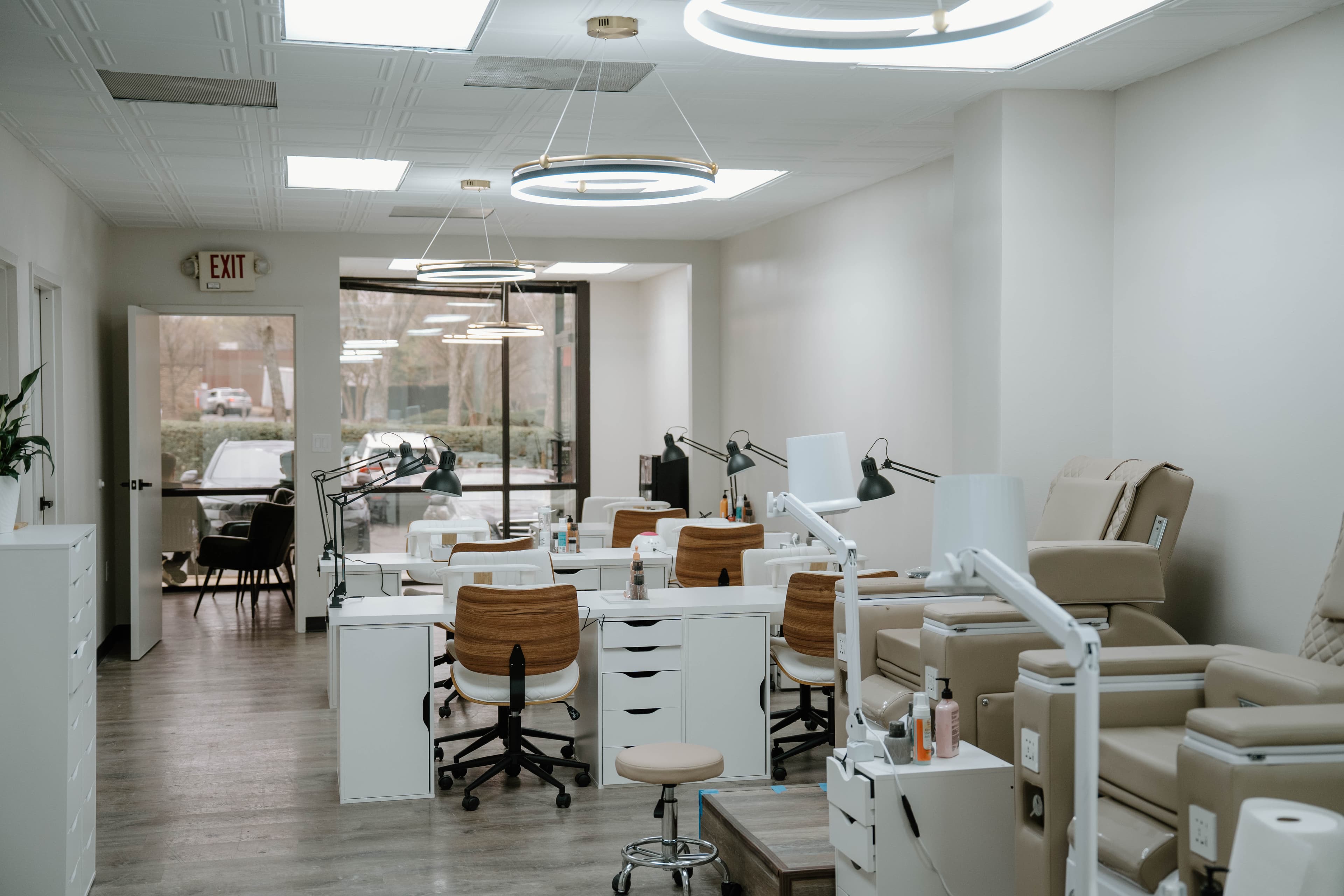Modern manicure lounge with natural light at 4Hands nail and head spa studio